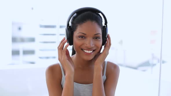 Beautiful Woman Dancing And Listening Music