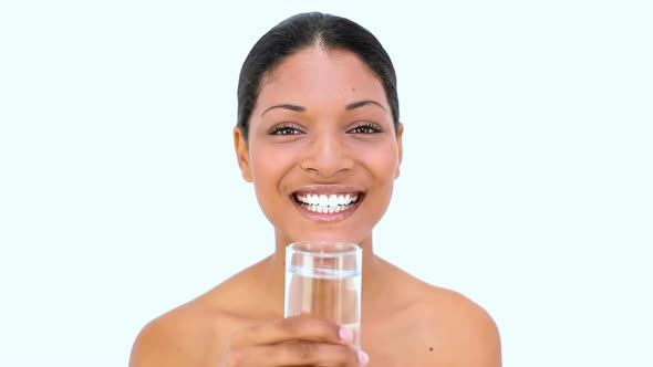 Beautiful Woman Drinking Water On White