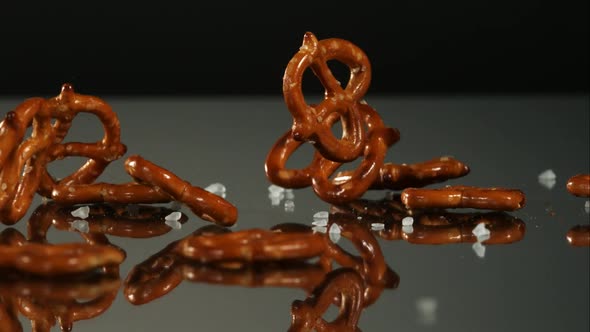 Pretzels falling and bouncing in ultra slow mo 1500fps - reflective surface - PRETZELS PHANTOM 