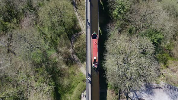 A Narrow Boat heading down stream to Cross the Pontcysyllte Aqueduct, famously designed by Thomas Te