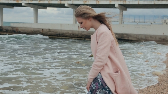 Beautiful Girl Is Sad Near The Sea alt