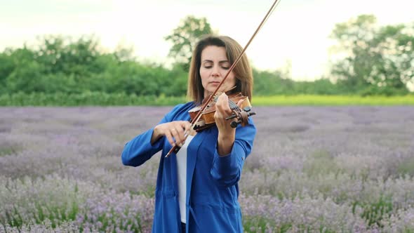 Violinist Playing in Lavender Field