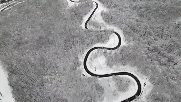 Snow Road In Mountains