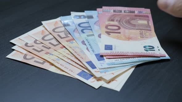 Euro money banknotes taking from the table 4K 2160p 30fps UHD footage - Different European Union ban