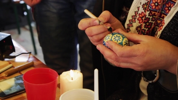 Man Paints The Easter Egg