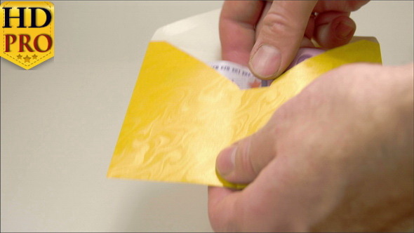 A Yellow Small Envelope with 3 Euro Bills