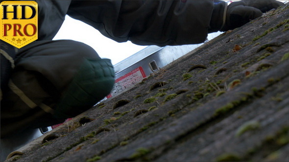 Closer Look of the Roofer Getting Off the Nails
