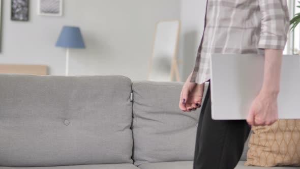 Old Woman Coming and Starting Work on Laptop