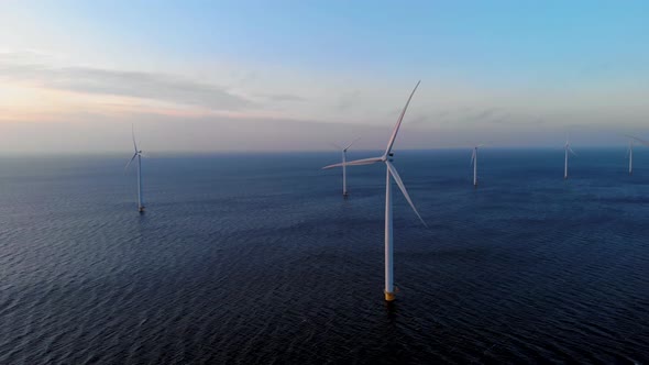 Windmill Park in the Ocean Drone Aerial View of Windmill Turbines Generating Green Energy Electric