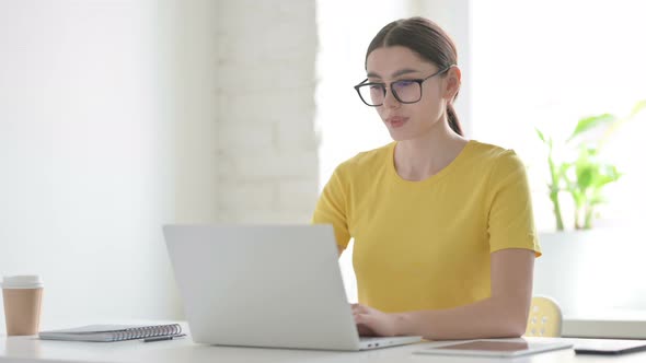 Sick Woman having Toothache while Working on Laptop