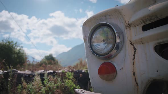 Old rusty truck's headlights