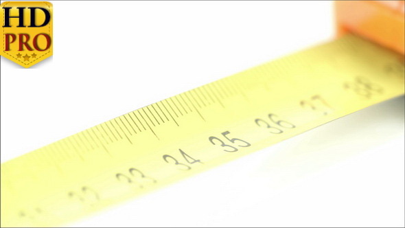 An Orange Tape Measure with Yellow Numbers