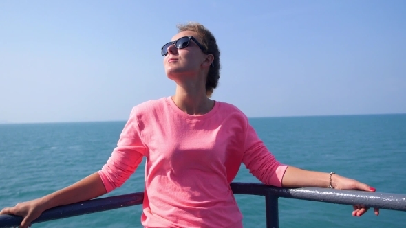 Attractive Girl Enjoying Sunny Day On Yacht Deck