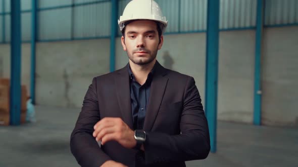 Portrait Confident Factory Manager Wearing Suit and Safety Helmet