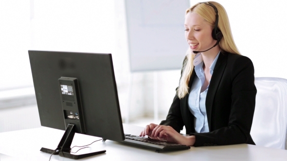 Smiling Helpline Operator Receiving Call In Office alt