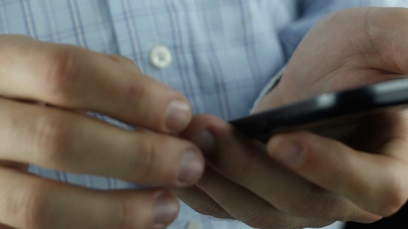 Businessman Working With Mobile Phone