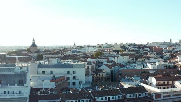 Forwards Fly Above Building in Urban Neighbourhood