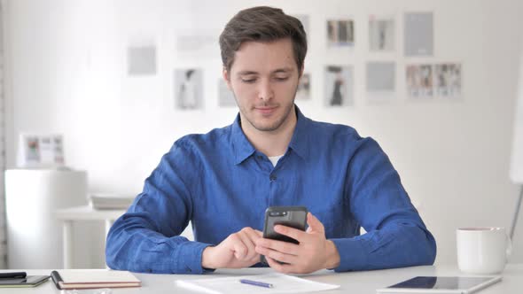 Casual Adult Man Using Smartphone, Typing Message