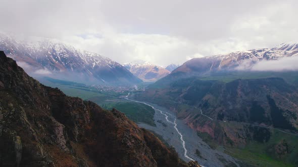 Peaks of Beautiful Snowcovered Mountains From Aerial Drone View