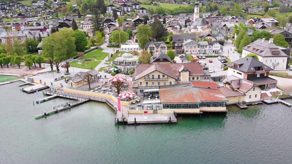 Aerial View of Mountain Lake Wolfgangsee with Houses of Resort Town in Austria, Alps