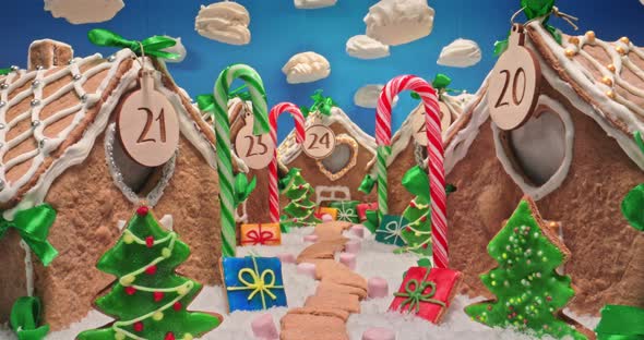 Beautiful Christmas gingerbread village with cookies, candies and snow