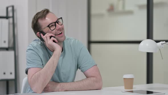 Young Man Talking Smartphone Work