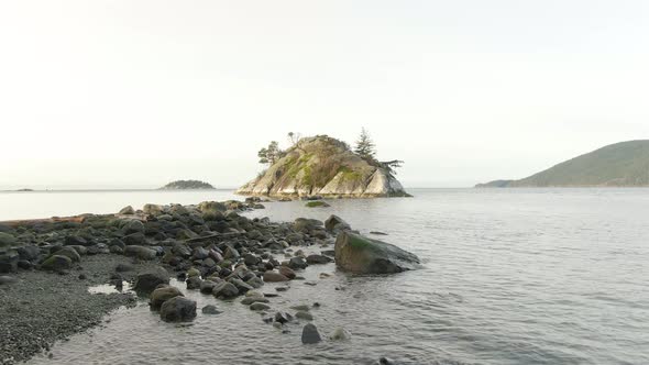 Aerial Panoramic View of Rocky Island on the Pacific Ocean West Coast