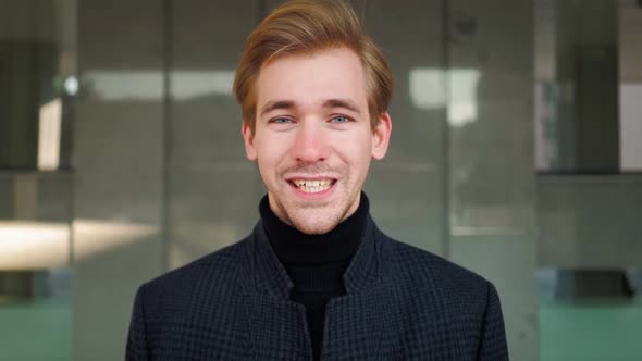 Portrait. Happy European Man Laughs Funny in Urban. Emotional Attractive Guy