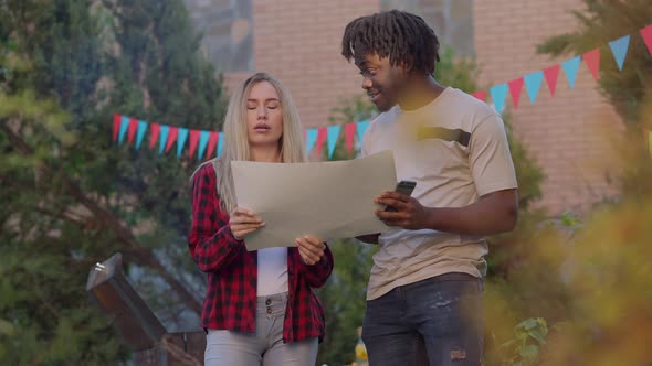 Excited Young African American Man Talking As Caucasian Woman Rolling Eyes Sighing