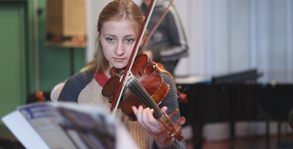 Beautiful Girl Playing the Violin