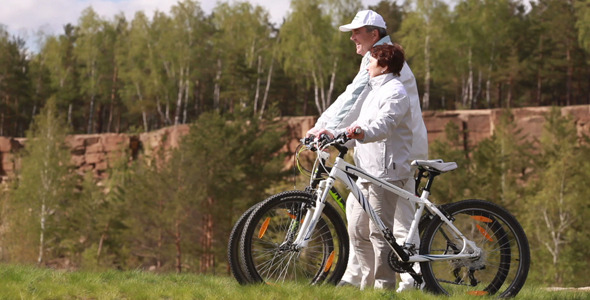 Senoir couple with bicycles