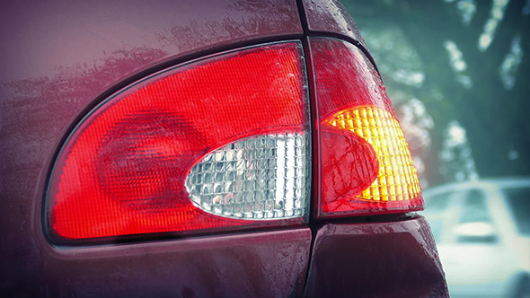 Flashing Car Light With Passing Cars The Rain