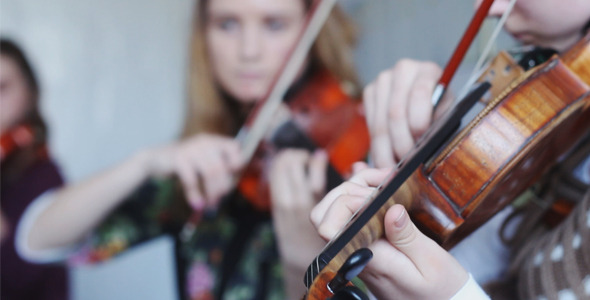 Beautiful Girls Playing the Violin