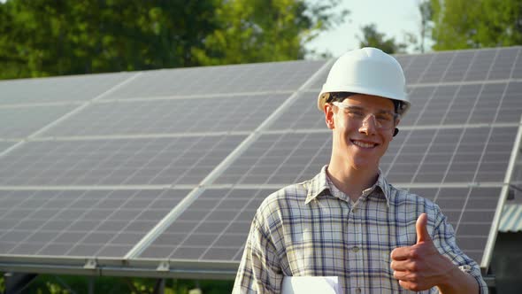 Engineer Checks Solar Panels Productivity