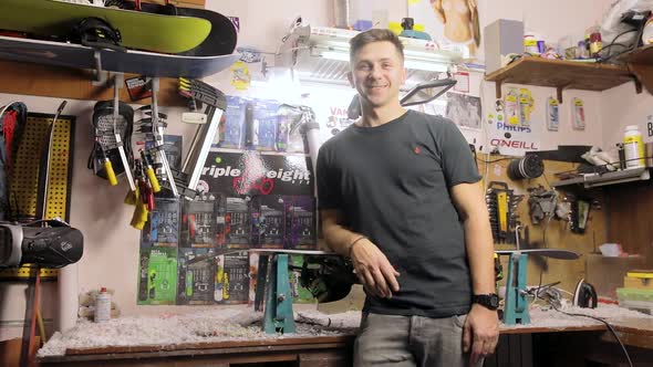  Portrait Of The Owner In Snowboard Workshop.