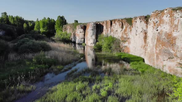 Aerial View: National Park in the Wild Taiga with Beautiful Rocks on the Banks.