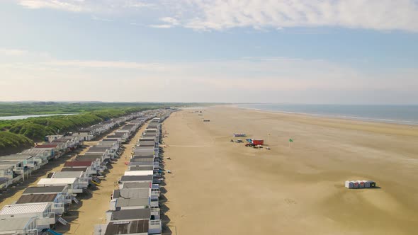 Aerial view flying over rows of beach houses