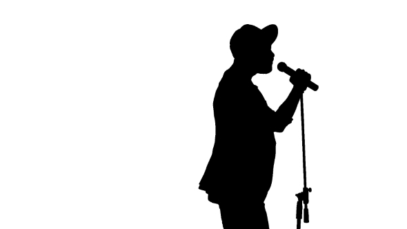 Black Silhouette Of Guy In a Cap Singing a Song