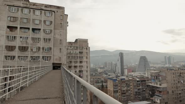 Panning View Of Old Soviet Building And New Modern Real Estates