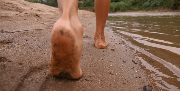 Feet Walking On Sand
