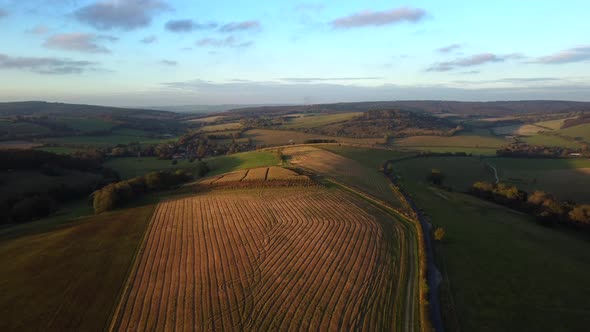 Aerial view of farmland and fields in England. Late evening in autumn