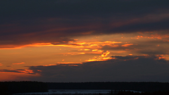 Clouds Moving Across the Sky at Sunset