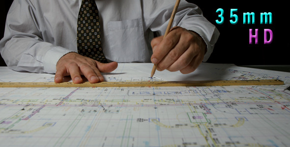 Architect Draws a Draft Using a Ruler