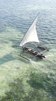 Vertical Video Boats in the Ocean Near the Coast of Zanzibar Tanzania