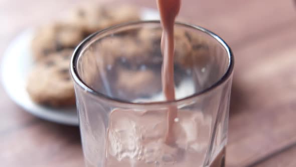 a Glass of Chocolate Milkshake on Table