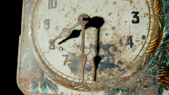 Old Clock Dial with Rusty Minute and Hour Hands Covered Corrosion