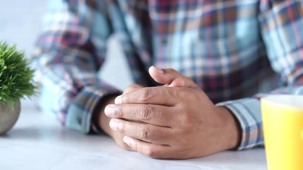 a Nervous Young Man Hand