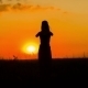 Silhouette Of a Girl Practicing Yoga  At Sunset - VideoHive Item for Sale