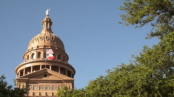 Austin Capital Outside Grounds Texas Flag Waves