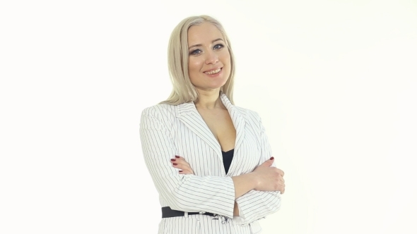 Portrait Of Successful Blonde In a White Jacket On